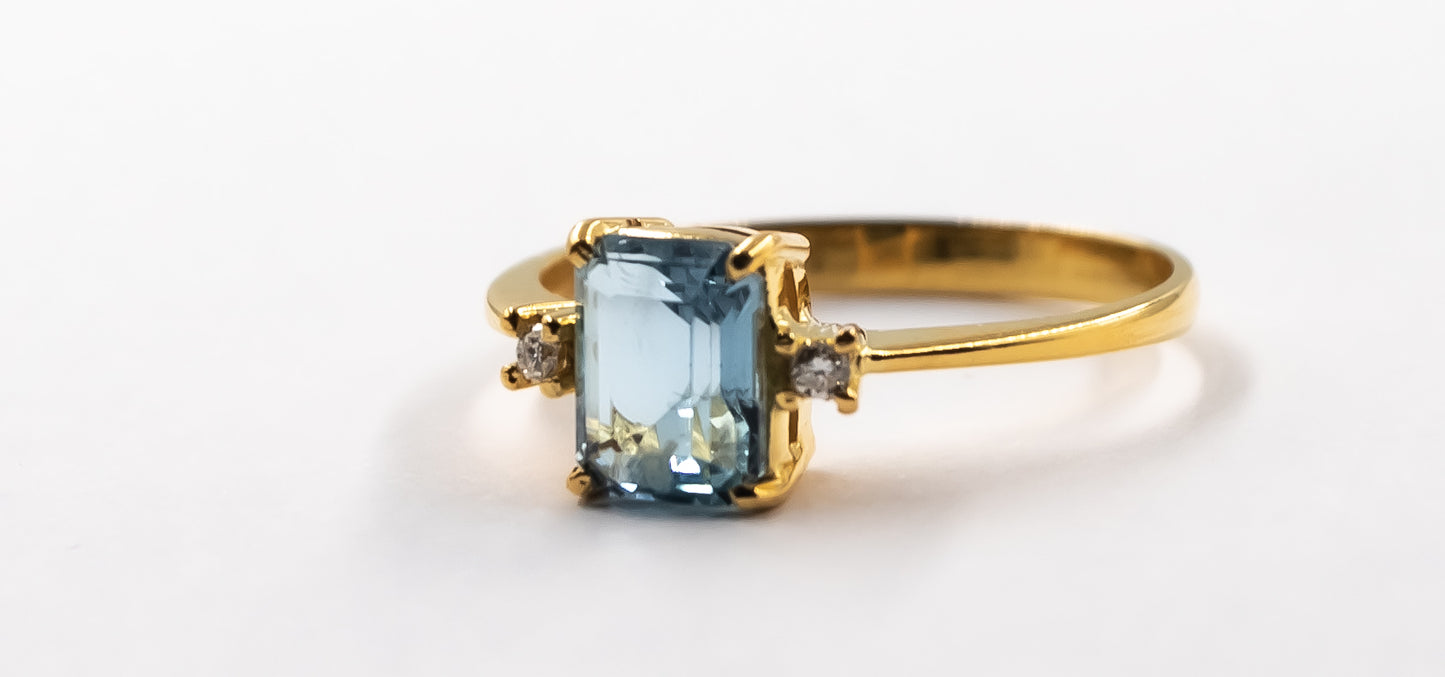Aquamarine With Diamond Step Cut Gold Ring