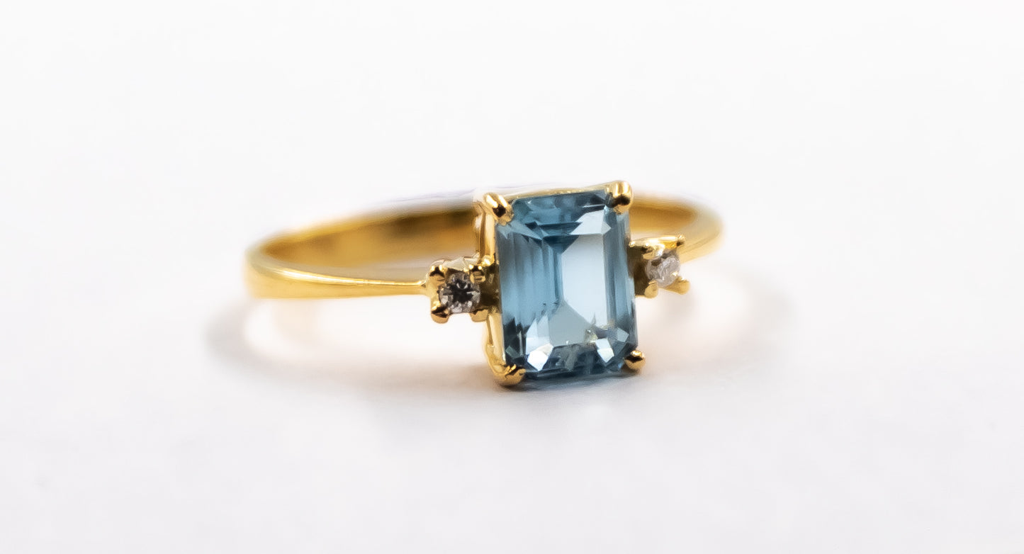 Aquamarine With Diamond Step Cut Gold Ring
